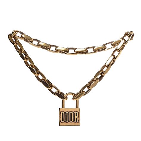 dior lock necklace.